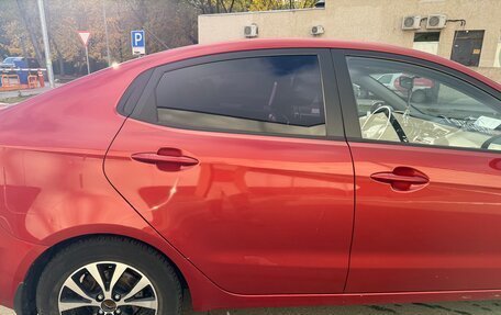 KIA Rio III рестайлинг, 2012 год, 900 000 рублей, 28 фотография