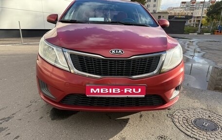 KIA Rio III рестайлинг, 2012 год, 900 000 рублей, 32 фотография