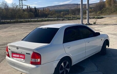 Mazda Familia, 2001 год, 280 000 рублей, 3 фотография