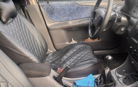 Mazda 323, 1998 год, 195 000 рублей, 4 фотография