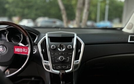 Cadillac SRX II рестайлинг, 2010 год, 900 000 рублей, 14 фотография