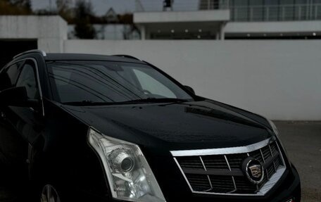 Cadillac SRX II рестайлинг, 2010 год, 900 000 рублей, 3 фотография