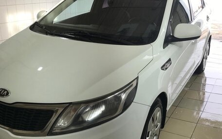 KIA Rio III рестайлинг, 2012 год, 640 000 рублей, 9 фотография