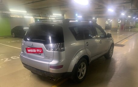 Mitsubishi Outlander III рестайлинг 3, 2007 год, 990 000 рублей, 4 фотография