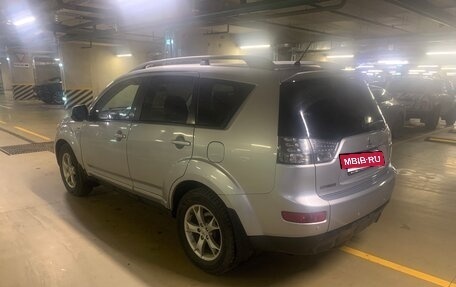 Mitsubishi Outlander III рестайлинг 3, 2007 год, 990 000 рублей, 2 фотография