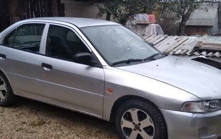 Mitsubishi Lancer VII, 1997 год, 170 000 рублей, 24 фотография