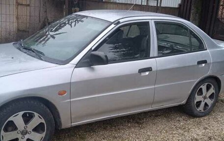 Mitsubishi Lancer VII, 1997 год, 170 000 рублей, 23 фотография