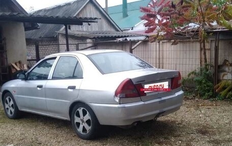 Mitsubishi Lancer VII, 1997 год, 170 000 рублей, 26 фотография