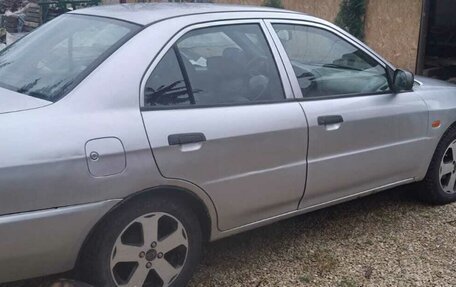 Mitsubishi Lancer VII, 1997 год, 170 000 рублей, 27 фотография