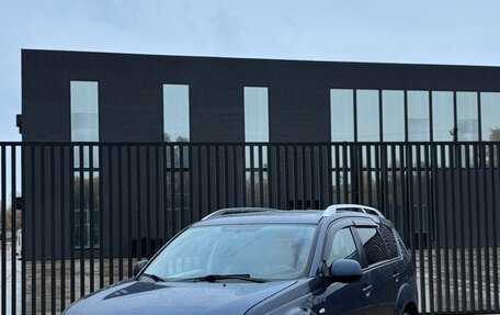 Mitsubishi Outlander III рестайлинг 3, 2007 год, 865 000 рублей, 2 фотография