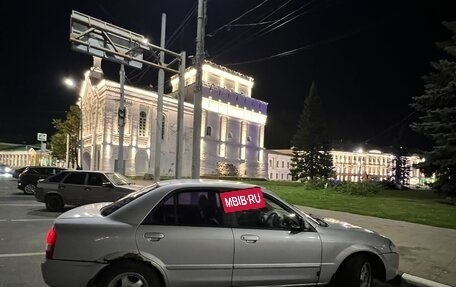 Mazda Familia, 1999 год, 100 000 рублей, 9 фотография