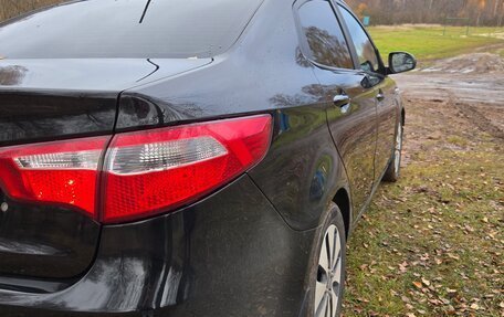 KIA Rio III рестайлинг, 2013 год, 700 000 рублей, 22 фотография