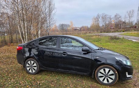 KIA Rio III рестайлинг, 2013 год, 700 000 рублей, 23 фотография