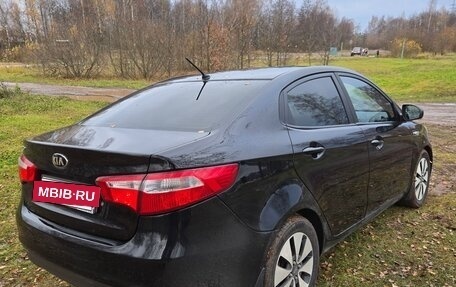 KIA Rio III рестайлинг, 2013 год, 700 000 рублей, 21 фотография