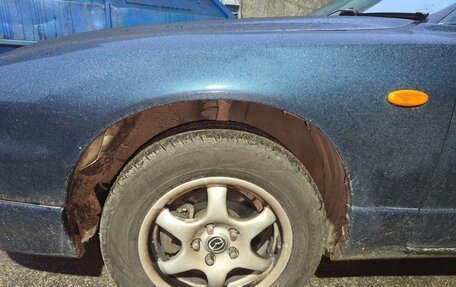 Mazda Millenia I рестайлинг, 1999 год, 350 000 рублей, 32 фотография