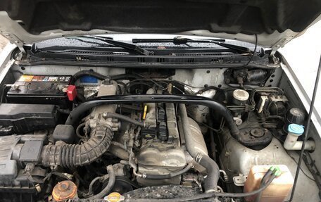 Suzuki Grand Vitara, 2004 год, 590 000 рублей, 13 фотография