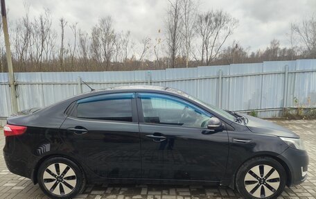 KIA Rio III рестайлинг, 2011 год, 680 000 рублей, 15 фотография