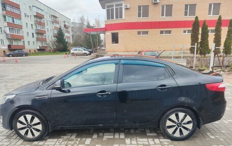 KIA Rio III рестайлинг, 2011 год, 680 000 рублей, 21 фотография