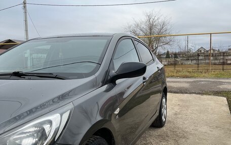 Hyundai Solaris II рестайлинг, 2011 год, 650 000 рублей, 3 фотография