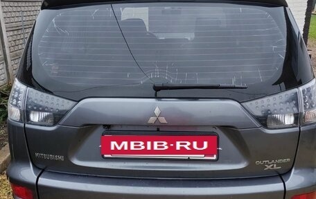 Mitsubishi Outlander III рестайлинг 3, 2011 год, 950 000 рублей, 2 фотография