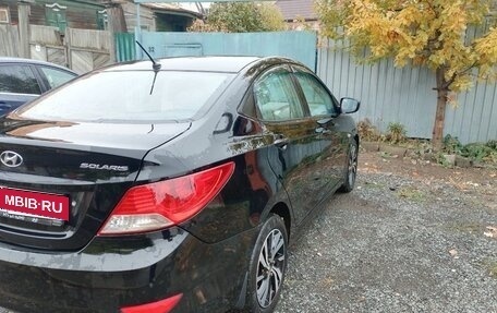 Hyundai Solaris II рестайлинг, 2011 год, 650 000 рублей, 7 фотография