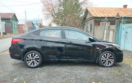 Hyundai Solaris II рестайлинг, 2011 год, 650 000 рублей, 8 фотография