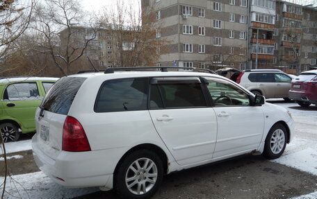 Toyota Corolla, 2004 год, 670 000 рублей, 4 фотография