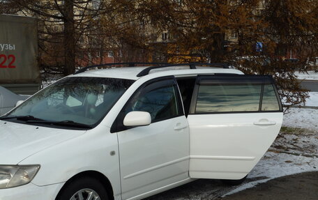 Toyota Corolla, 2004 год, 670 000 рублей, 14 фотография