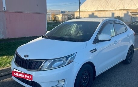 KIA Rio III рестайлинг, 2012 год, 750 000 рублей, 7 фотография