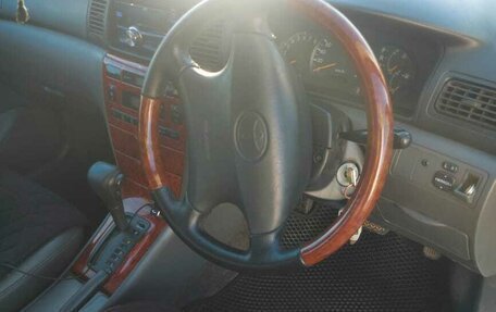 Toyota Corolla, 2002 год, 20 фотография