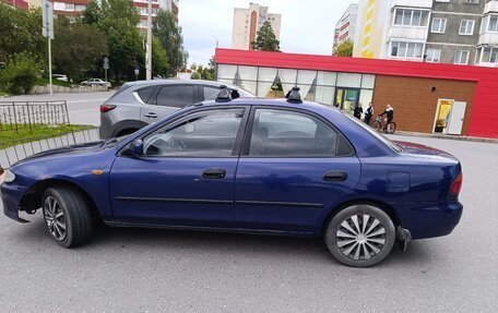 Mazda 323, 1994 год, 170 000 рублей, 2 фотография