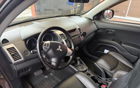 Mitsubishi Outlander III рестайлинг 3, 2010 год, 1 580 000 рублей, 11 фотография
