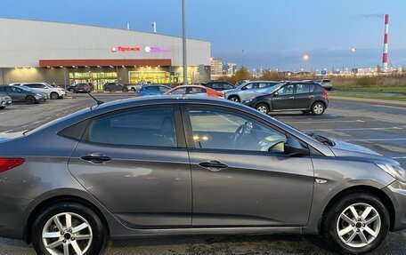 Hyundai Solaris II рестайлинг, 2011 год, 655 000 рублей, 21 фотография