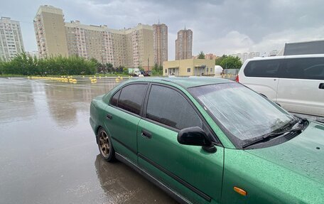 Mitsubishi Carisma I, 1998 год, 210 000 рублей, 9 фотография