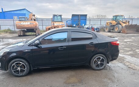 KIA Rio III рестайлинг, 2012 год, 750 000 рублей, 11 фотография