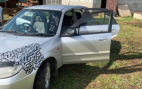 Mazda Familia Y11, 2001 год, 375 000 рублей, 15 фотография