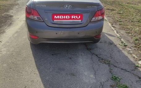 Hyundai Solaris II рестайлинг, 2011 год, 650 000 рублей, 3 фотография