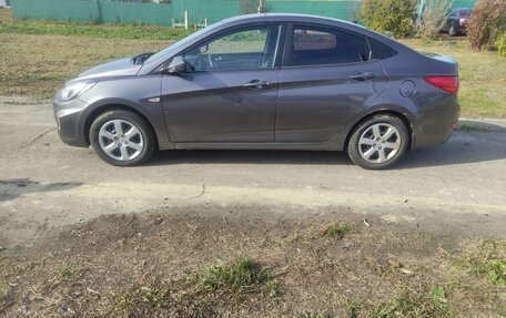 Hyundai Solaris II рестайлинг, 2011 год, 650 000 рублей, 8 фотография