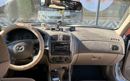 Mazda Protege, 2001 год, 350 000 рублей, 8 фотография