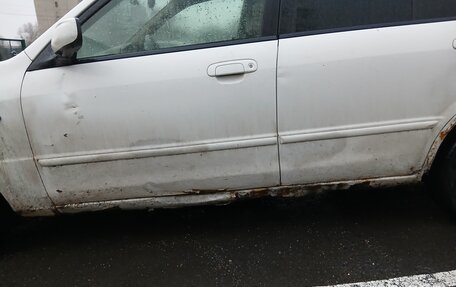 Mazda Familia, 2003 год, 130 000 рублей, 8 фотография