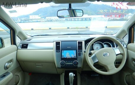 Nissan Tiida, 2010 год, 1 050 000 рублей, 9 фотография