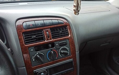 Toyota Avensis III рестайлинг, 1999 год, 450 000 рублей, 8 фотография