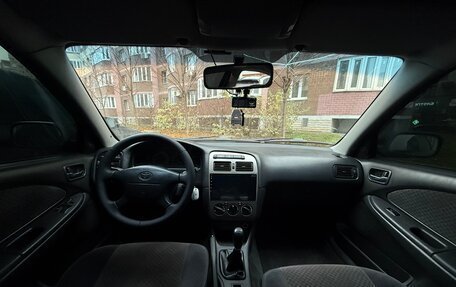 Toyota Avensis III рестайлинг, 2002 год, 600 000 рублей, 12 фотография
