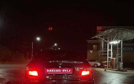 Toyota Avensis III рестайлинг, 2002 год, 600 000 рублей, 11 фотография