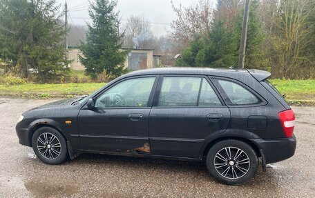 Mazda 323, 2002 год, 175 000 рублей, 9 фотография