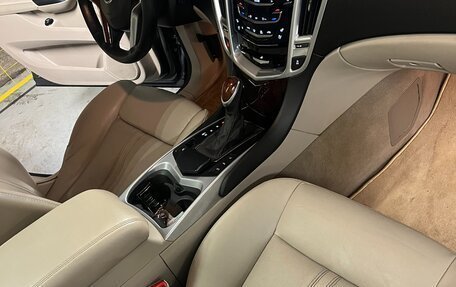 Cadillac SRX II рестайлинг, 2013 год, 1 650 000 рублей, 21 фотография