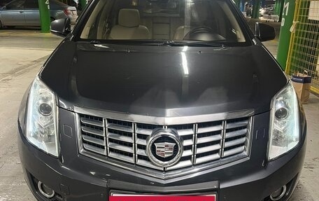Cadillac SRX II рестайлинг, 2013 год, 1 650 000 рублей, 17 фотография