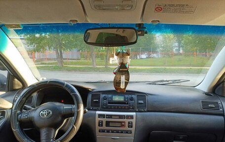 Toyota Corolla, 2004 год, 575 000 рублей, 13 фотография