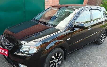 KIA Rio II, 2011 год, 730 000 рублей, 8 фотография