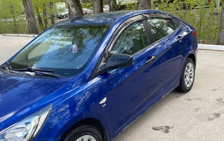 Hyundai Solaris II рестайлинг, 2012 год, 650 000 рублей, 21 фотография